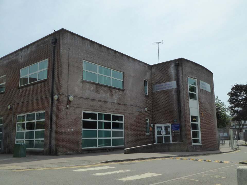 Patcham Library and Community Centre on Ladies’ Mile Road, a two-storey red brick building with large windows and a curved entrance tower