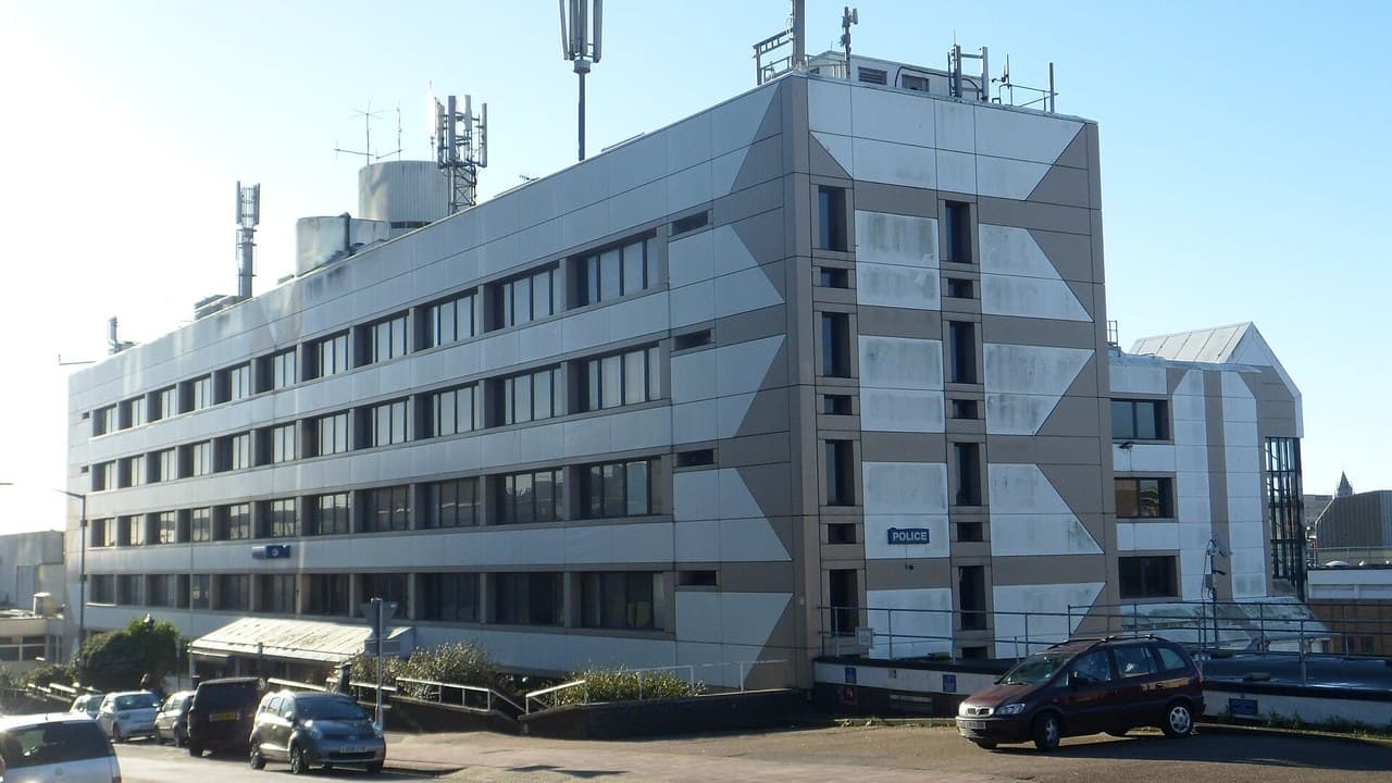 Brighton Police Headquarters on John Street in Brighton under a clear blue sky