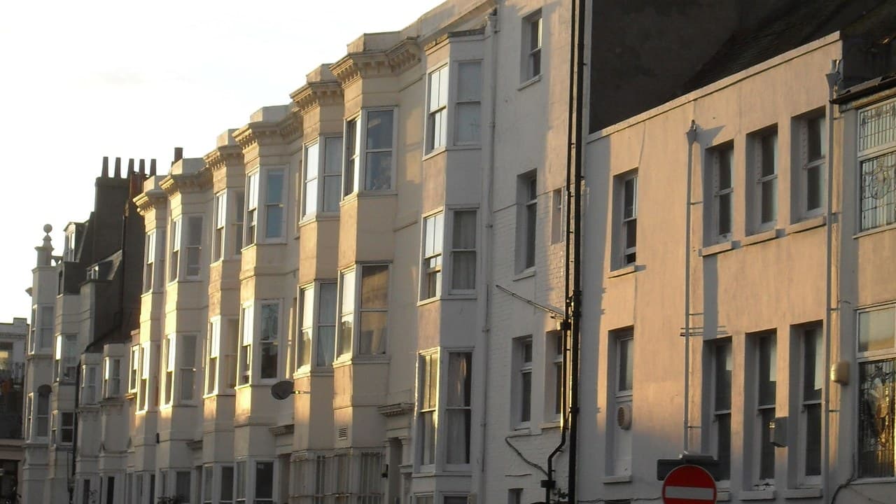 The north side of Clarence Square in Brighton, a terrace of white stucco houses at the back of the Western Road site