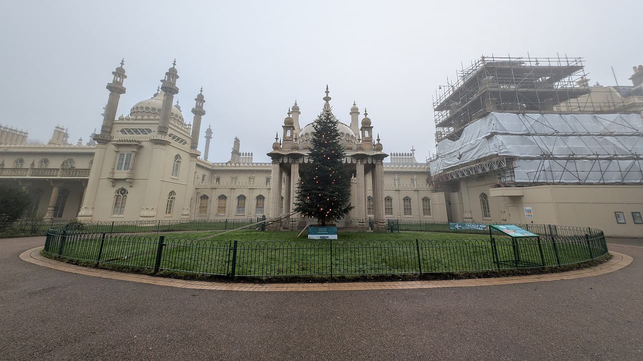 The Royal Pavilion in Brighton with its Christmas tree on a foggy Christmas Eve in 2024